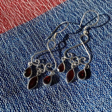 Load image into Gallery viewer, Silver earrings with a trio of garnet rain drops